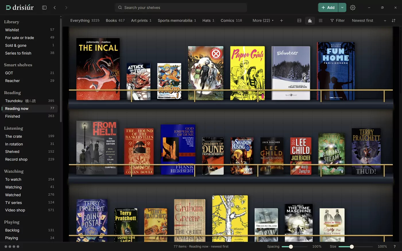 The Reading now shelf in the Speakeasy finish: dark blue shelves with brass rails in front of the covers.