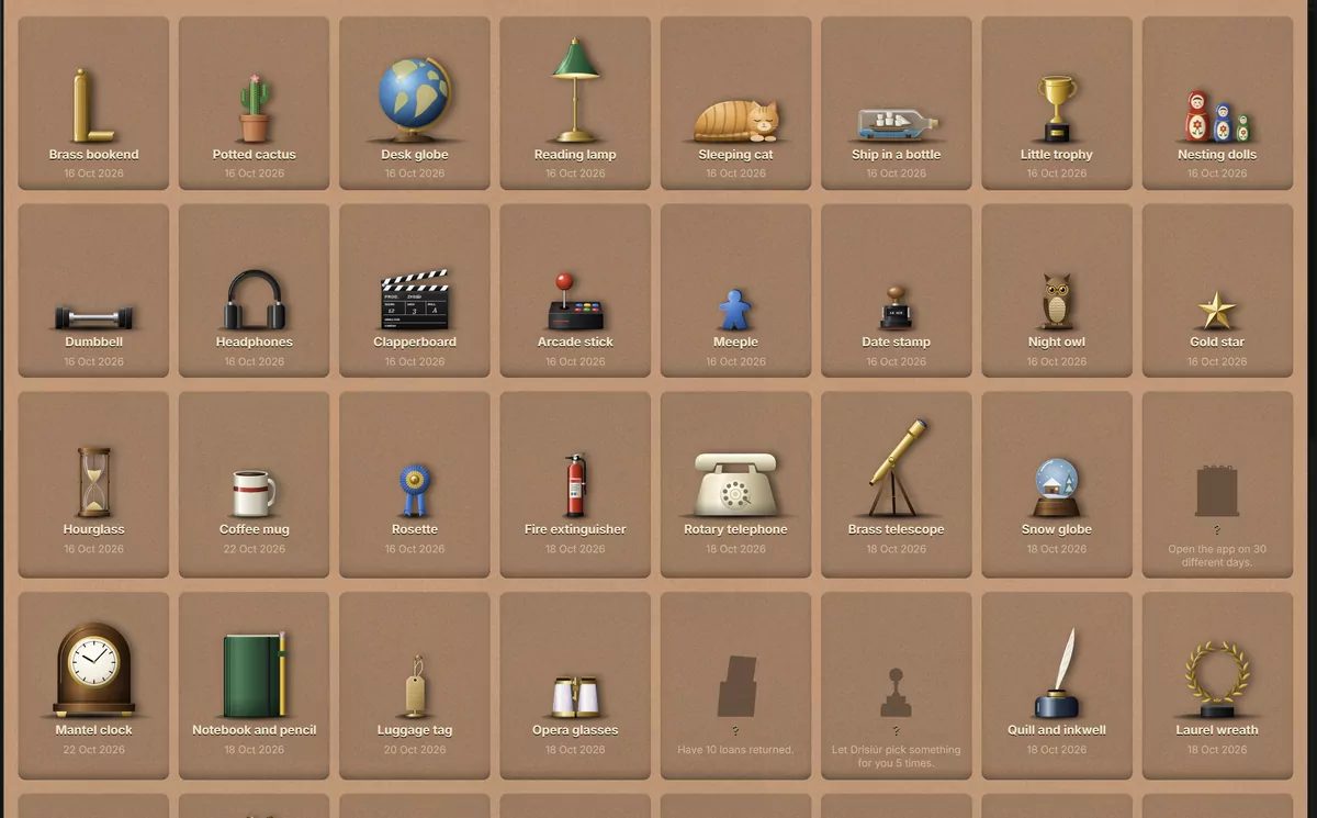A cabinet of small drawn objects in square compartments: a brass bookend, a potted cactus, a desk globe, a reading lamp, a sleeping cat and more.
