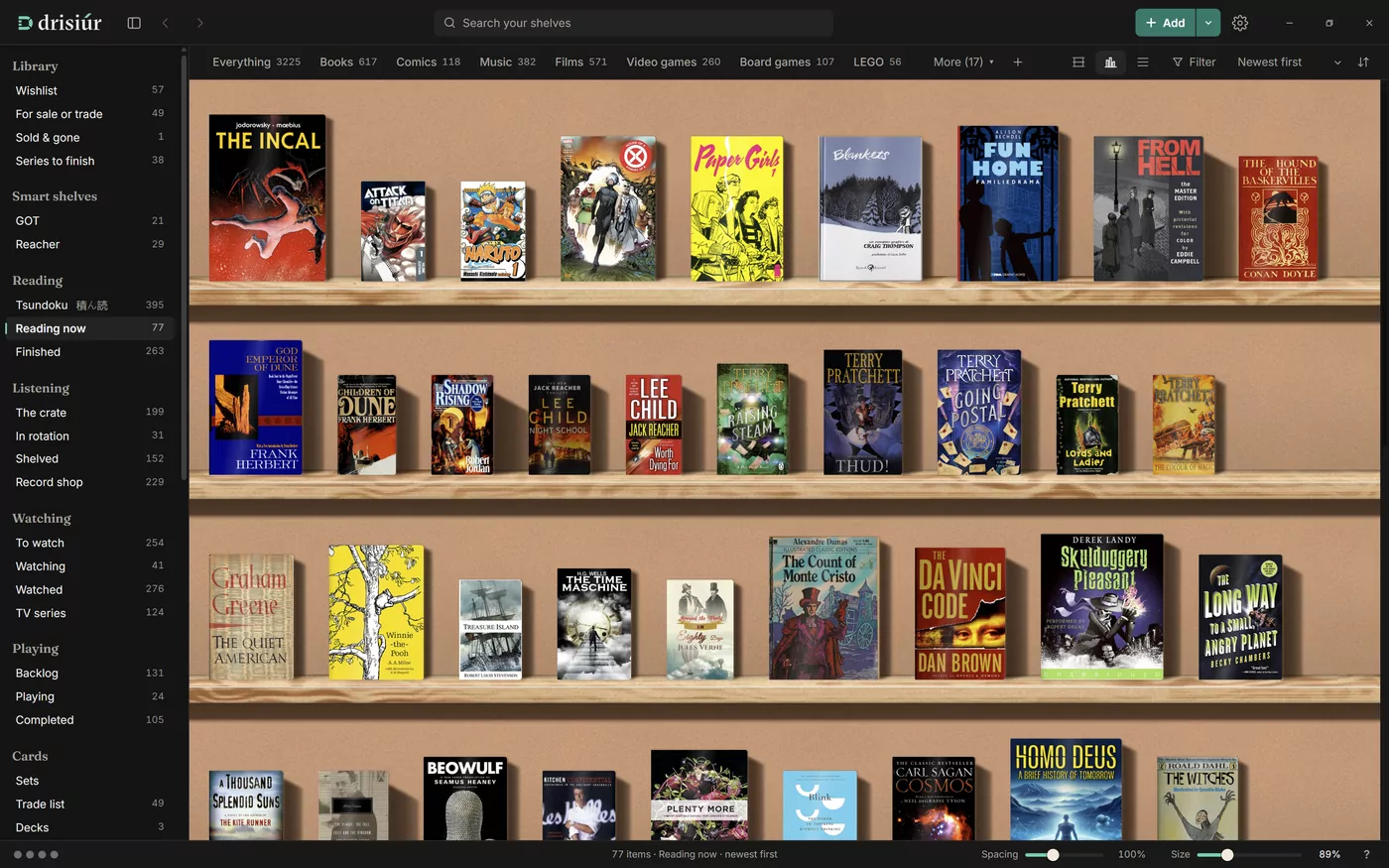 The Drisiúr window: a sidebar of shelves, and paperbacks and graphic novels standing face out on warm wooden shelves.